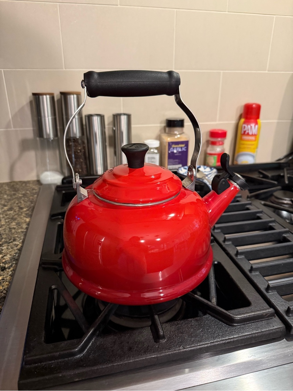 Le Crueset Red Whistling Stovetop Kettle with Black Handle